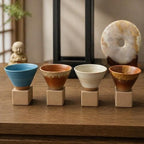The Cone Cup Collection: Set of 4 Ceramic Cones/Same iconic sip. Meet the 3.4oz Cone Cup Set Four bold cones, Four square holders, one unforgettable coffee moment. Microwave & Dishwasher Safe by Unknown