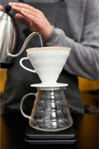 Black Ceramic V60 02 Dripper for Filter Coffee, Smooth Finish, 0-199ml Capacity, Includes Care Instructions - Image 5