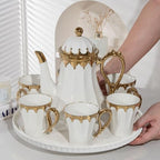 Elegant White and Gold Ceramic Tea Set with Teapot, 6 Cups, and Serving Tray (Po Guang Bai) - Image 2