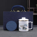 Dehua Porcelain Tea Mug with Lid and Infuser, 380ml Office Cup, Chinese Landscape Pattern, Gold Accents, Leather Coaster, Gift Box Set (Riding the Wave Style A) by Weixiyang