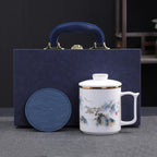 Dehua Porcelain Tea Mug with Lid and Infuser, 380ml Office Cup, Chinese Landscape Pattern, Gold Accents, Leather Coaster, Gift Box Set (Riding the Wave Style A) by Weixiyang