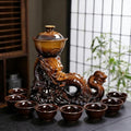 Chinese Gongfu Tea Set Ceramic Teapot with Infuser, 8 Cups, Semi Automatic Dragon Design for Loose Leaf Tea by Unknown