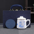 Dehua Porcelain Tea Mug with Lid and Infuser, 380ml Office Cup, Chinese Landscape Pattern, Gold Accents, Leather Coaster, Gift Box Set (Harmony is Precious Style C) by Weixiyang