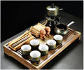 Chinese Gongfu Tea Set - Ceramic Teapot with Cups and Saucer, Includes Buddha Statue - Complete Tea Brewing Set for Home and Tea Ceremonies by Unknown