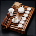 Chinese Gongfu Tea Set - Ceramic Teapot with Cups and Saucer, Includes Buddha Statue - Complete Tea Brewing Set for Home and Tea Ceremonies by Unknown